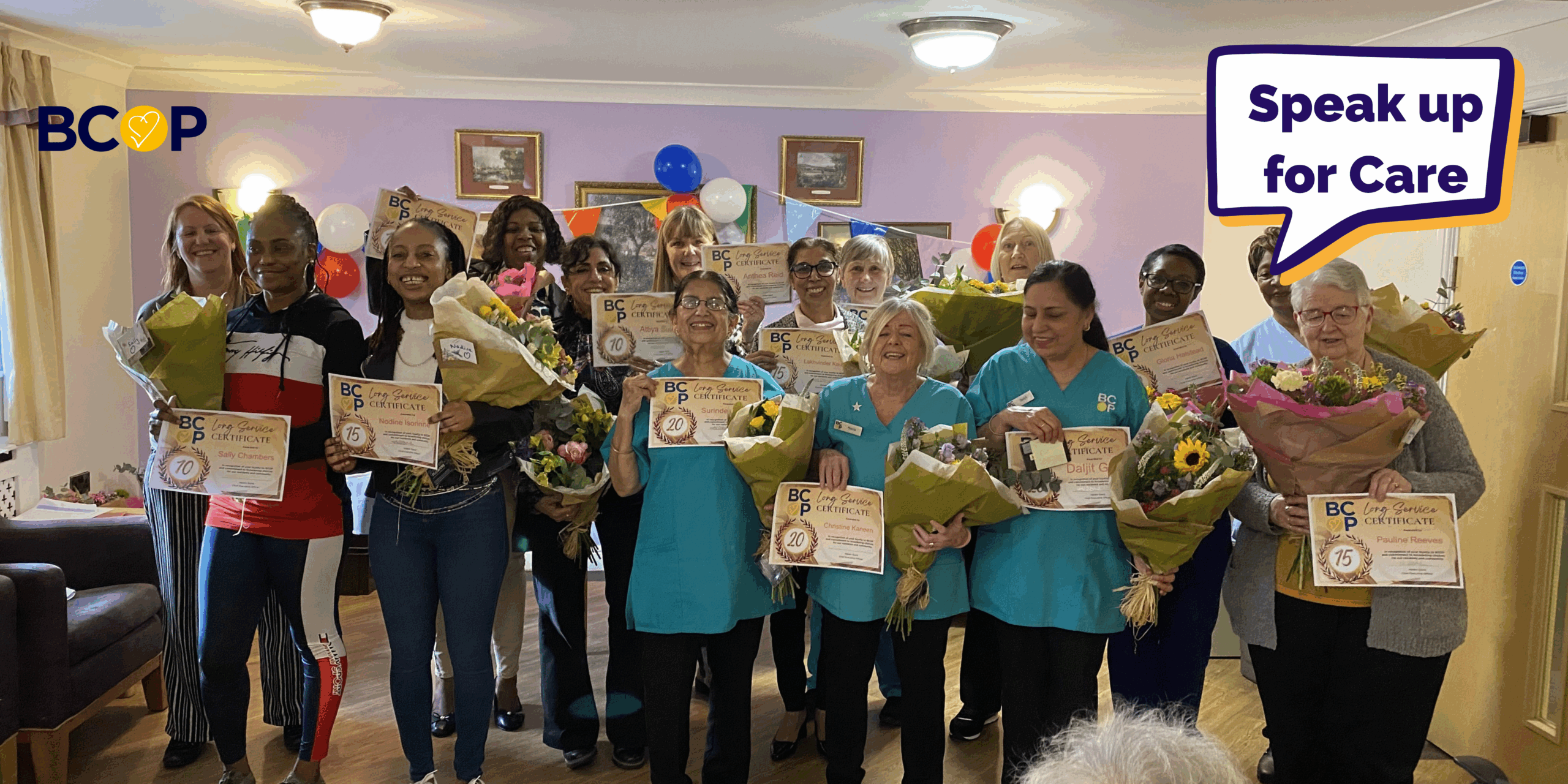 Staff at Robert Harvey House at the long service awards celebration