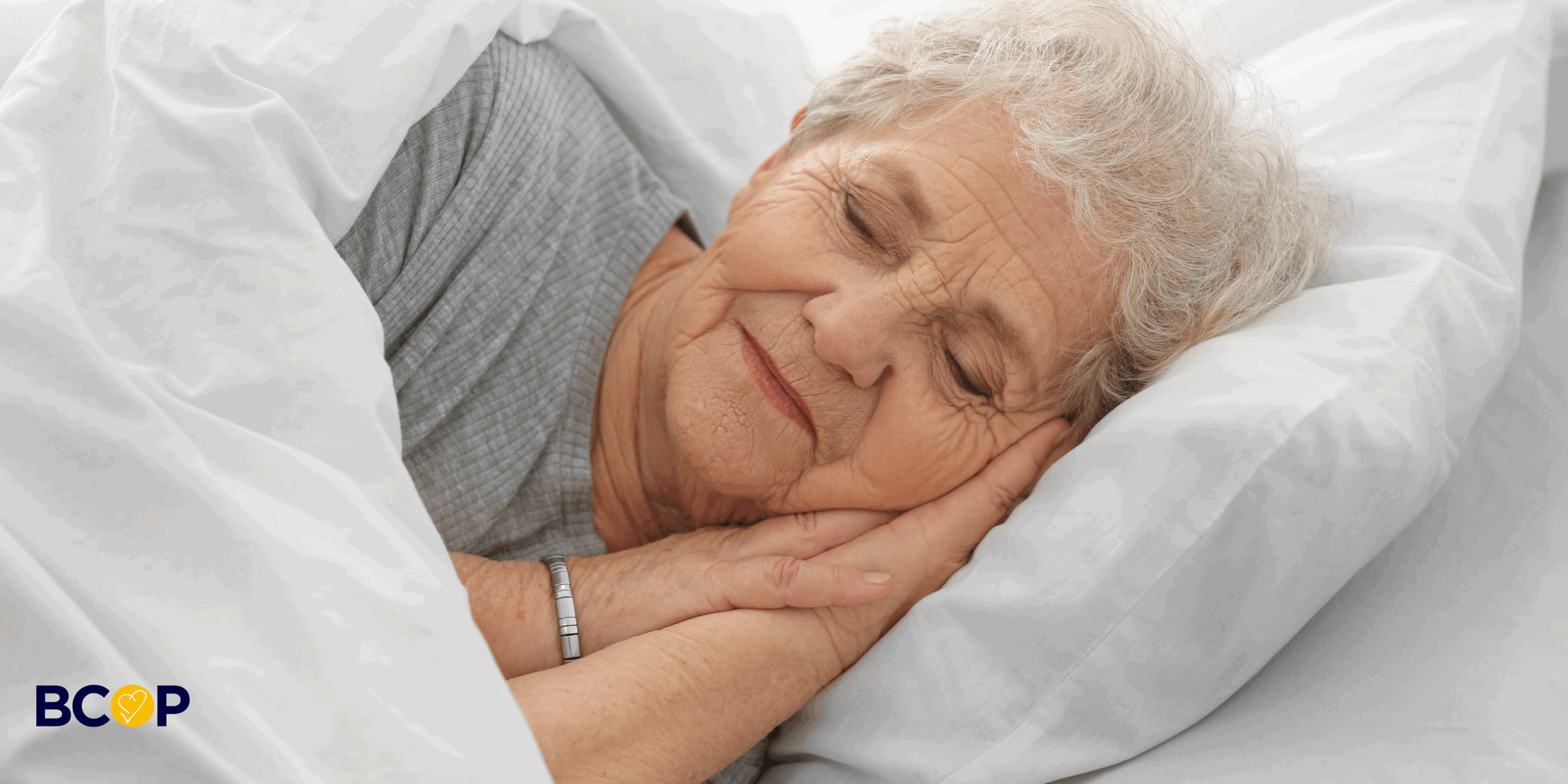 Older woman enjoying a good nights' sleep