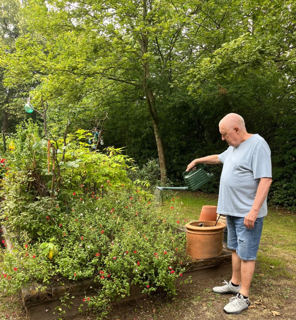 Ian Raid in the garden at Whitley Court