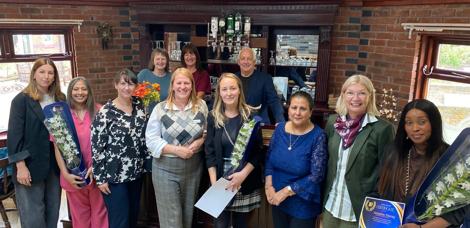 Long service award winners with BCOP Helen Gore and Trustees at Neville Williams House in September 2025