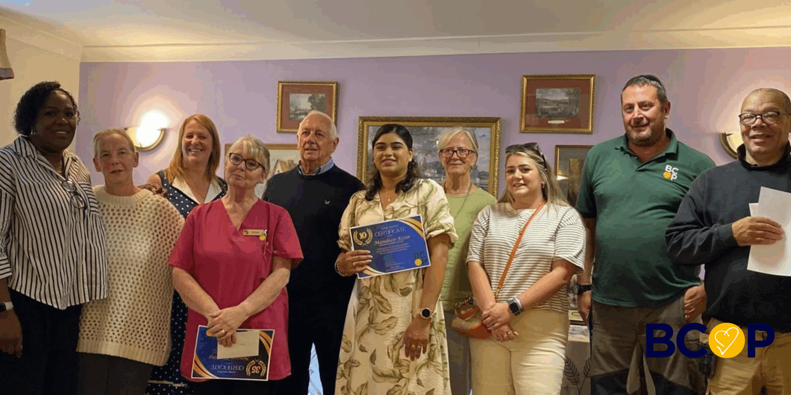 Long service award winners with CEO Helen Gore and BCOP Trustees at Robert Harvey House September 2025