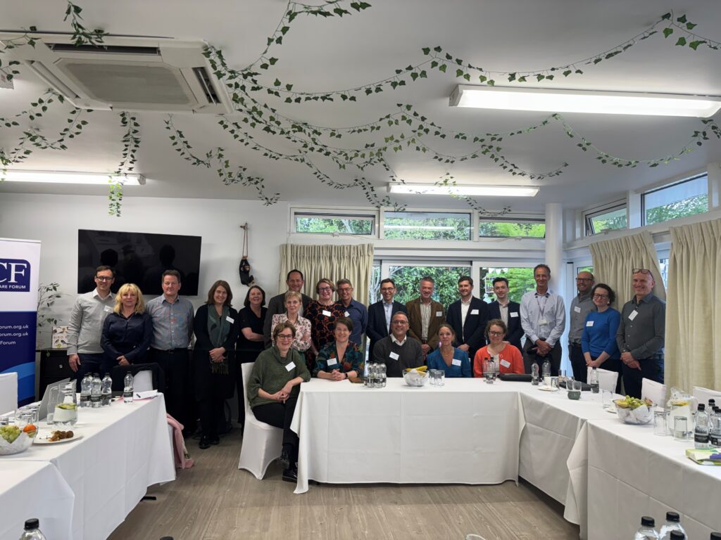 Photo of Brainkind staff and residents meeting with NCF and senior DHSC officials