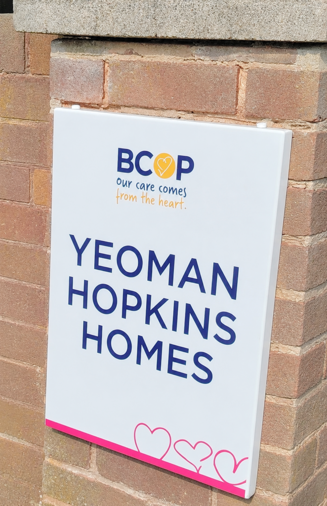 Photo of the new BCOP sign at the entrance to Yeoman Hopkins homes