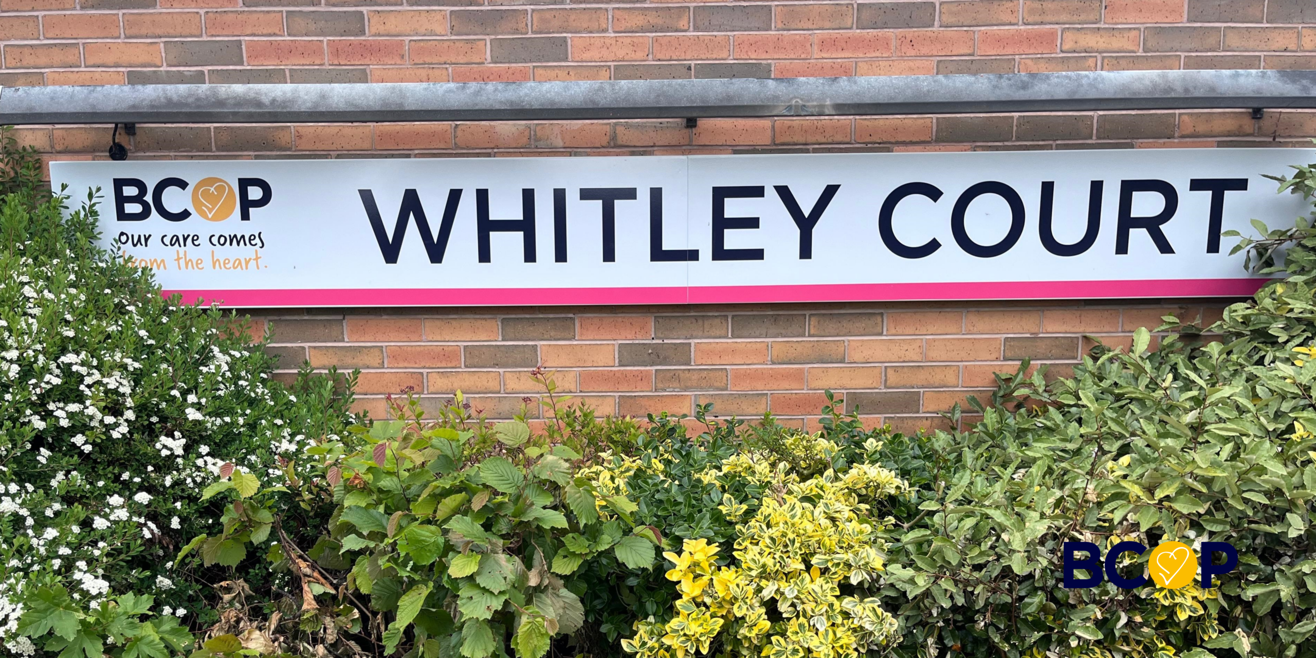 Photo of the new BCOP sign at the entrance to Whitley Court