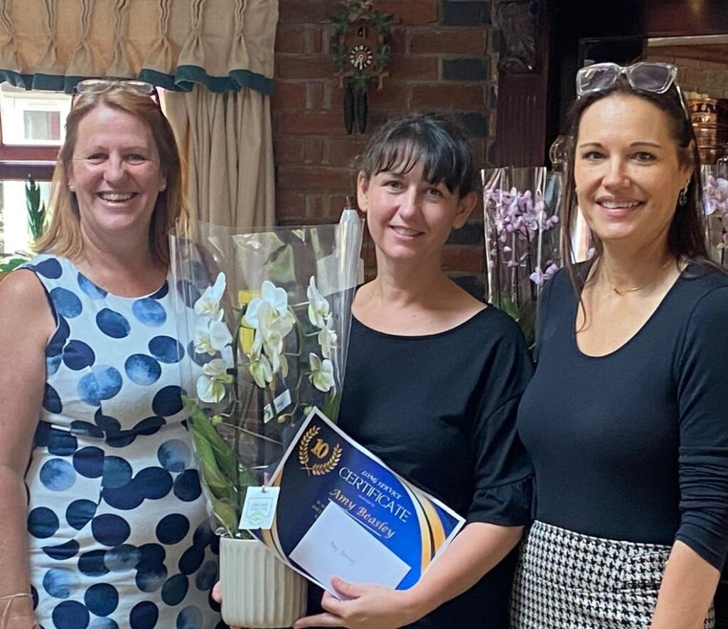 Helen Gore, Amy Beasley and Caroline  Sampson at the 2026 long servcie awards at Neville Williams House.