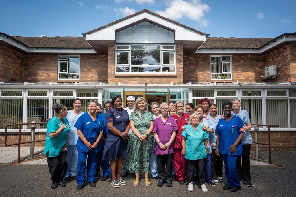 Anthea Reid (centre) with the team at Robert Harvey House